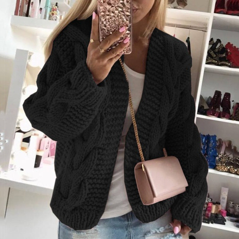 Women's knitted cardigan with elegant cable patterns Lune London