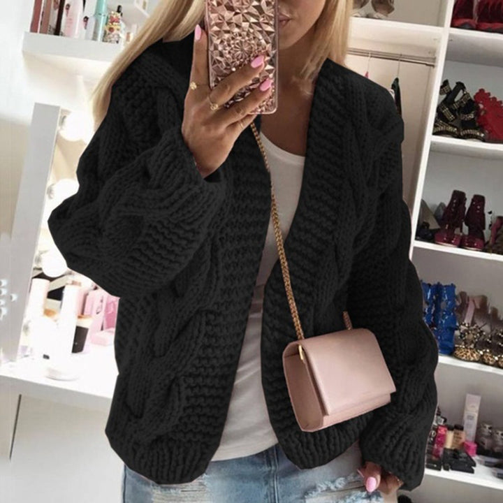 Women's knitted cardigan with elegant cable patterns Lune London