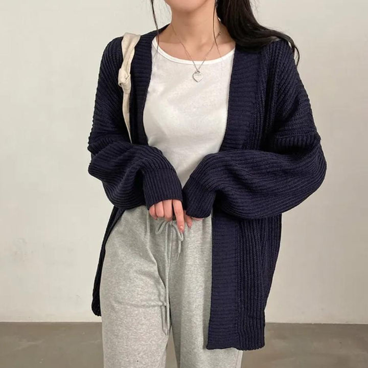 Plus size knitted jacket for women with wide sleeves and a structured texture Lune London