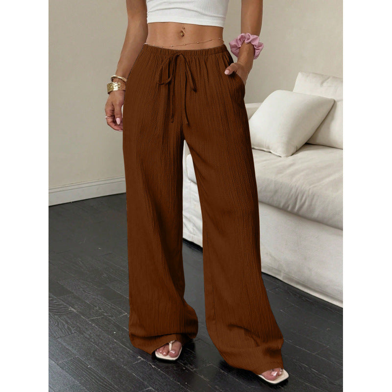 Casual and wide trousers for women with elastic waist and tie belt Lune London