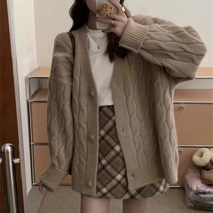 Thick knitted cardigan for women with classic cable patterns and a relaxed fit Lune London