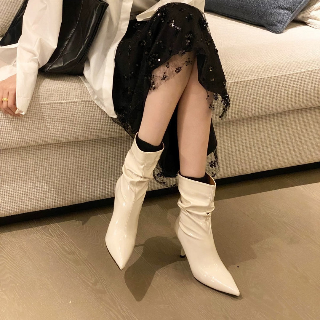 Elegant ladies boots with pointed toe and innovative pleated design Lune London