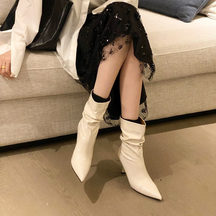 Elegant ladies boots with pointed toe and innovative pleated design Lune London