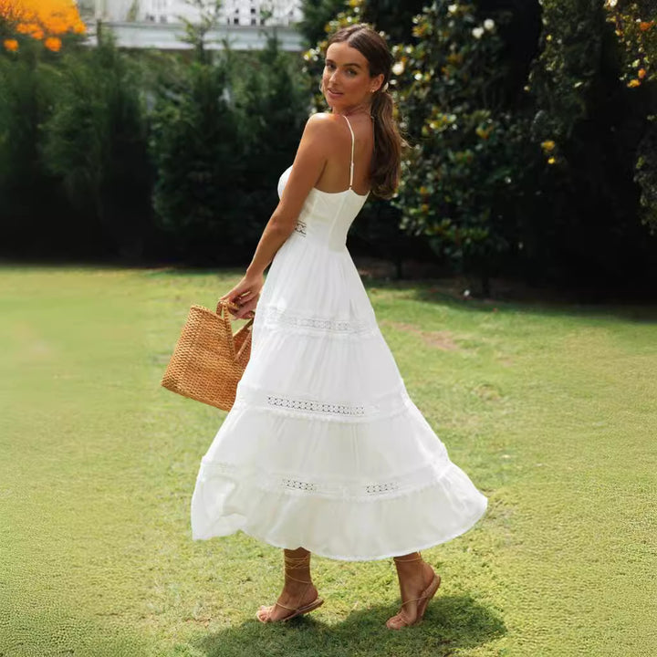 Robe maxi femme avec un nœud ludique et de délicates volants Chic & Stil