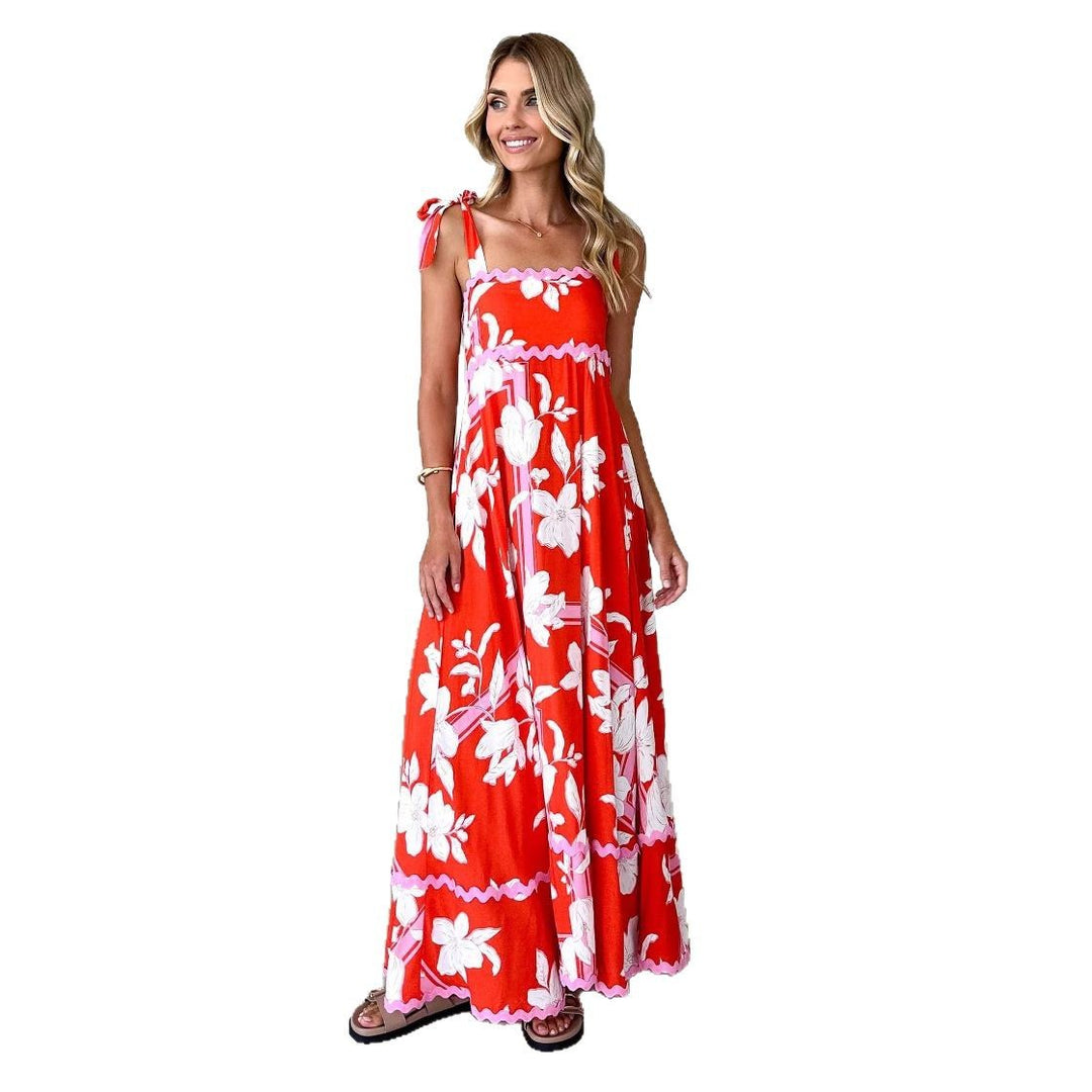 Maxi dress for women with a playful strap design and a chic & stylish print