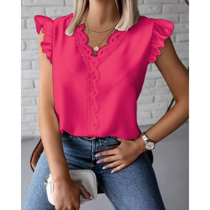 Women's blouse with ruffle details and lace appliqués Lune London