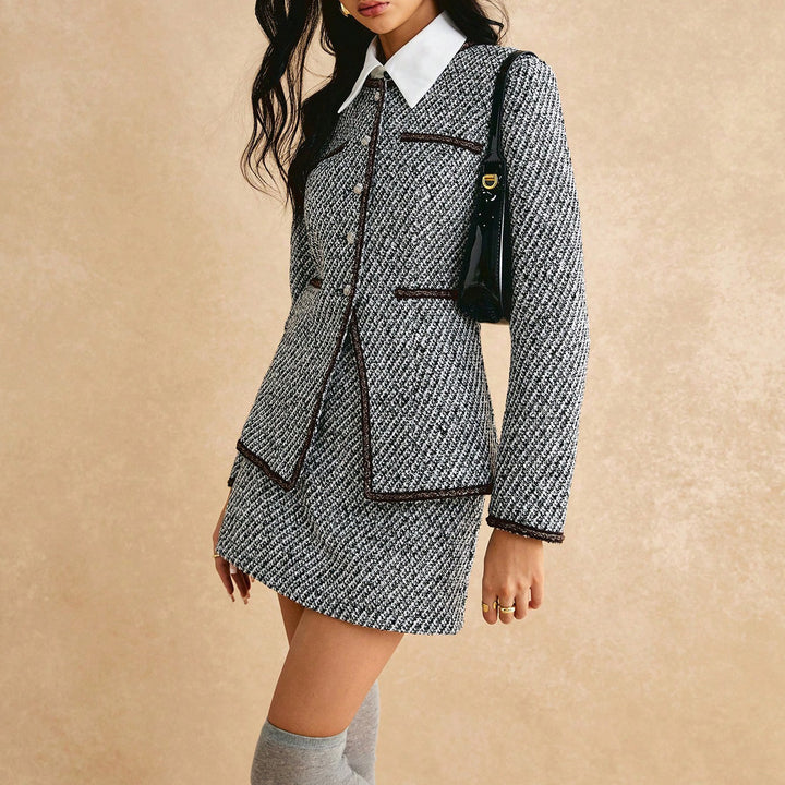 Ladies elegant tweed suit with textured jacket and chic dress