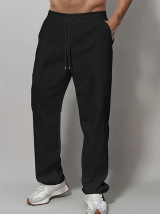 Men's Sporty Relaxed Fit Jogging Pants with Elastic Waistband and Side Pockets Chic & Stil