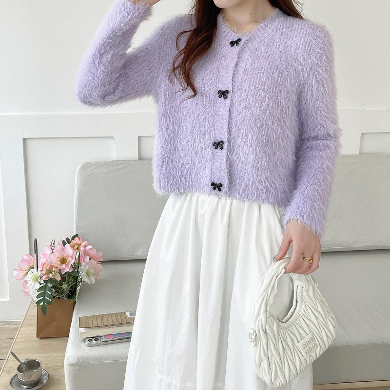 Women's cozy wool pullover with decorative bow buttons Lune London