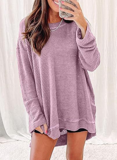 Waffle knit long sleeve sweater for women with open cut and side slits Lune London