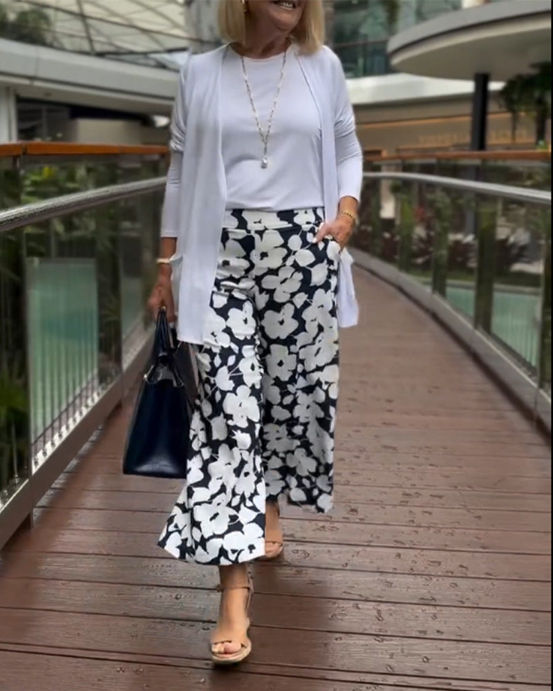 Pantalons d'été larges pour femmes avec motif floral et taille élastique Chic & Stil