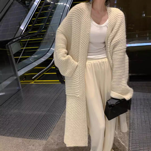 Cardigan en gros tricot pour femmes avec poches ouvertes et coupe décontractée Chic & Stil