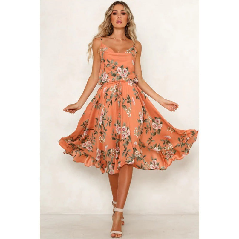 Robe midi femme avec motif floral et silhouette aérienne Chic & Stil
