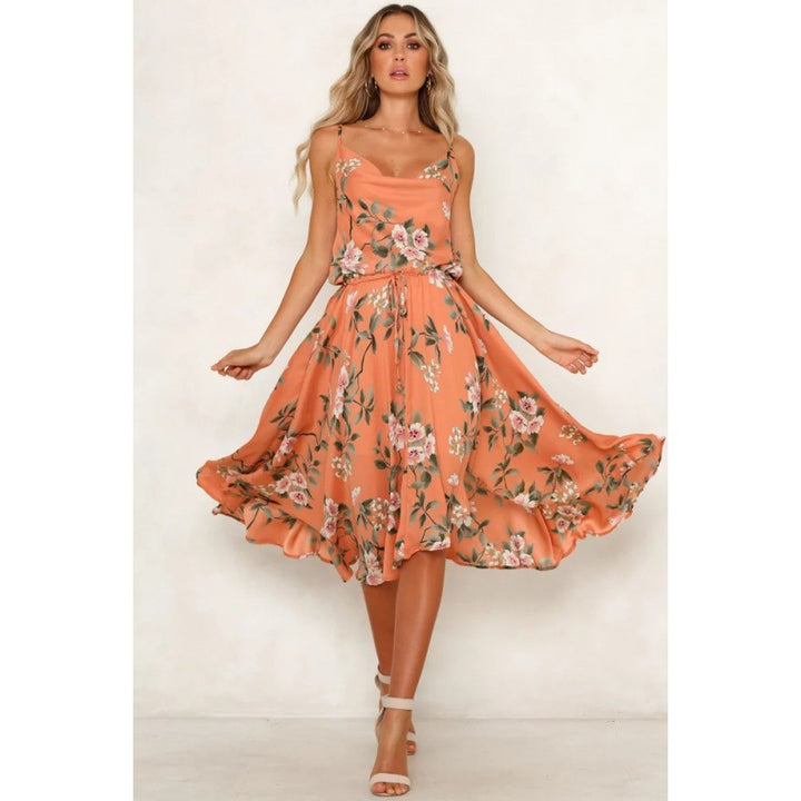 Robe midi femme avec motif floral et silhouette aérienne Chic & Stil