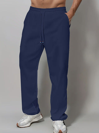 Men's Sporty Relaxed Fit Jogging Pants with Elastic Waistband and Side Pockets Chic & Stil