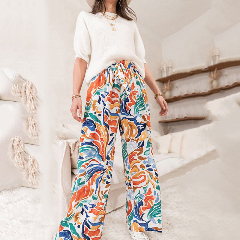 Wide palazzo pants for women with colorful pattern and elastic waist Lune London