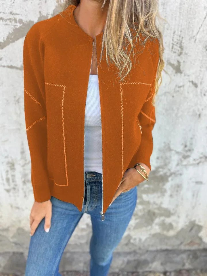 Ladies' knit jacket with stylish zipper details and a fine textured pattern Lune London