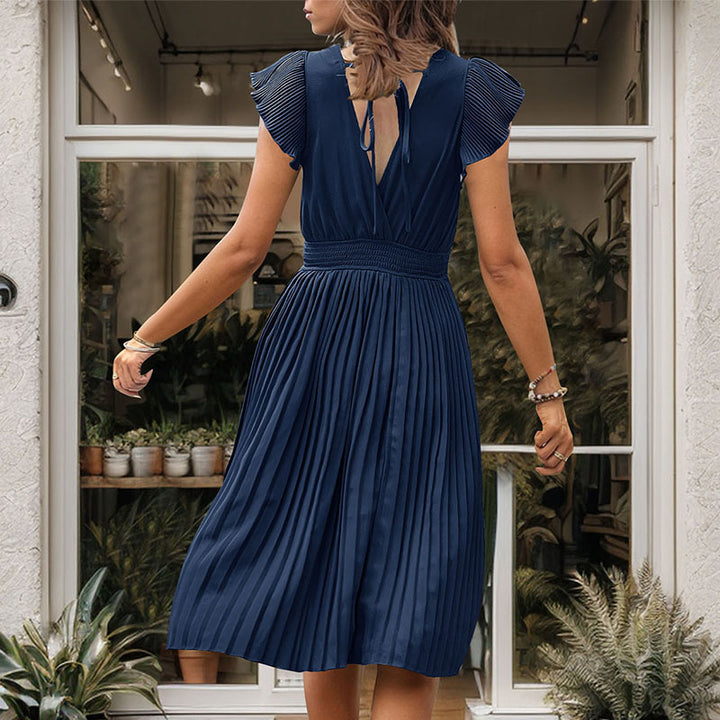 Robe midi plissée pour femmes avec col en V et manches volumineuses Chic & Stil