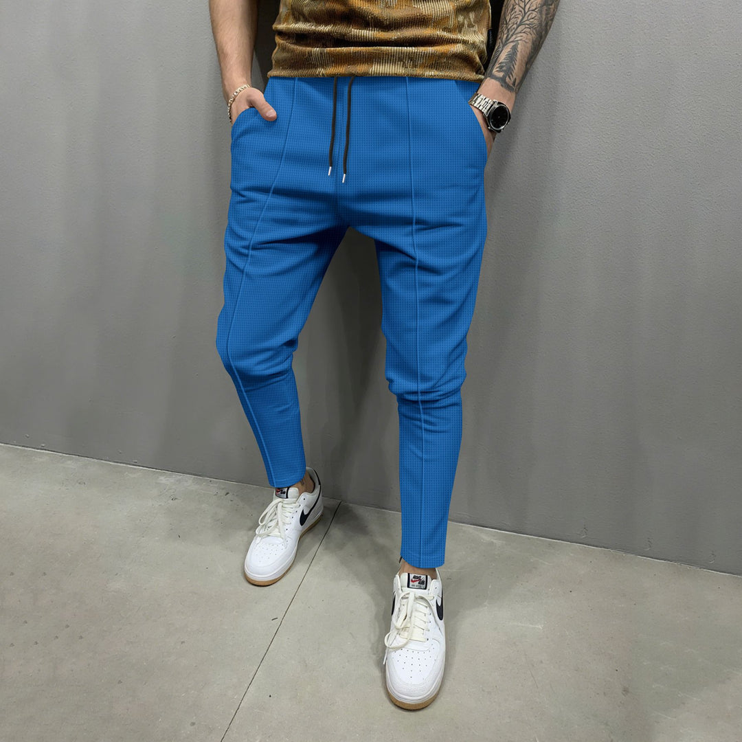 Trendy jogger pants for men with an elastic waistband and practical pockets Lune London
