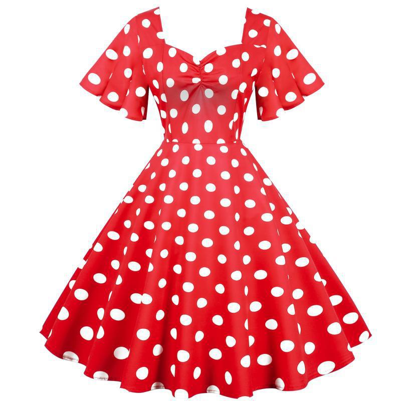 Robe Rockabilly pour femmes avec un motif amusant à pois et un ourlet flottant Chic & Stil