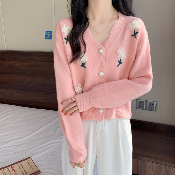 Playful women's cardigan button with floral embroidery and pearl buttons Lune London