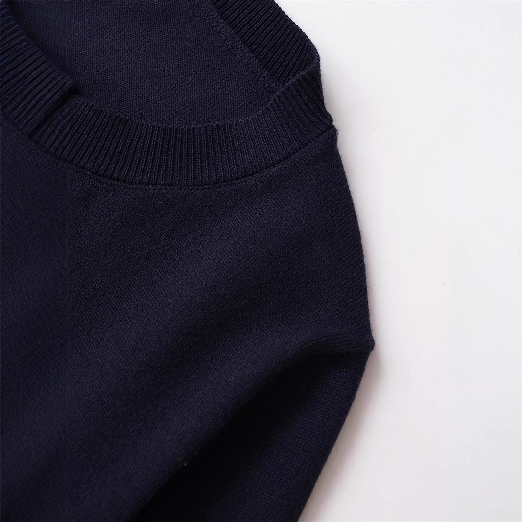 Women's knit jacket with a playful ruffled hem and chic button details Lune London