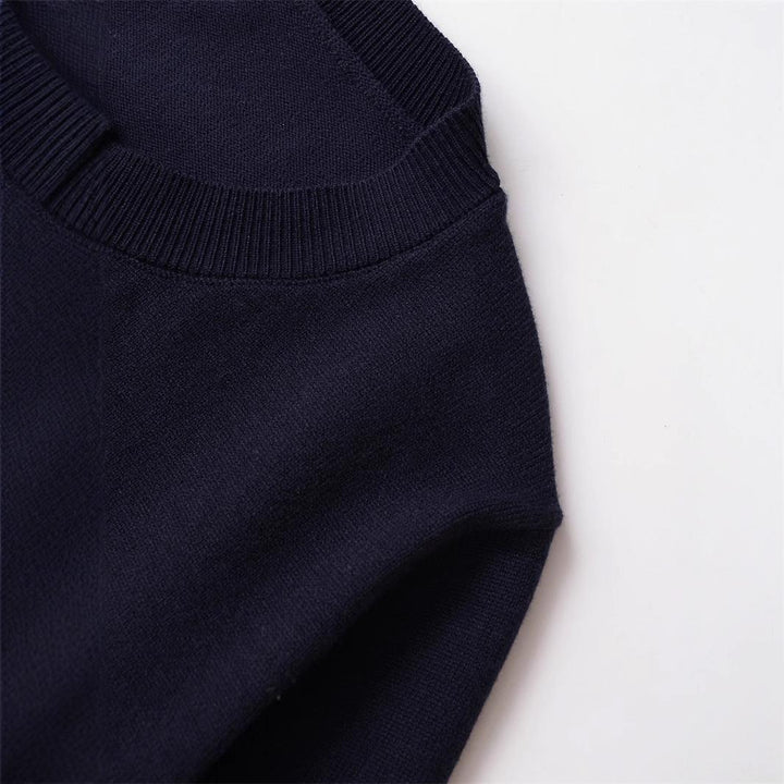 Women's knit jacket with a playful ruffled hem and chic button details Lune London