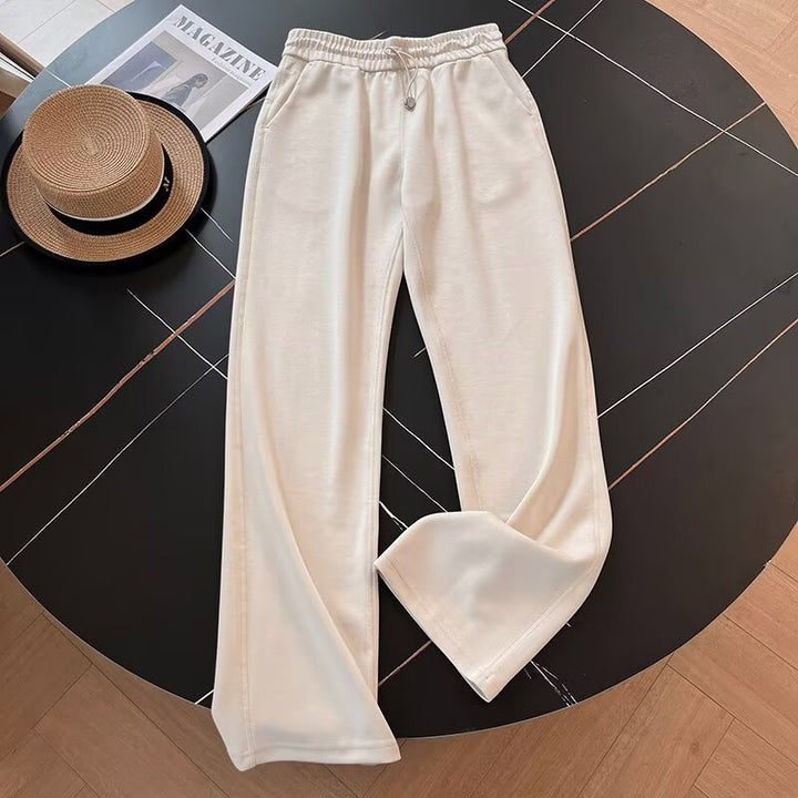 Pantalons de loisirs sportifs pour femmes avec taille élastique et poches latérales Chic & Stil