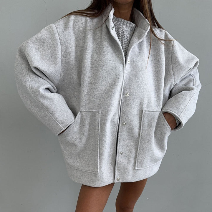 Oversized wool coat for women with simple button details and practical pockets Lune London