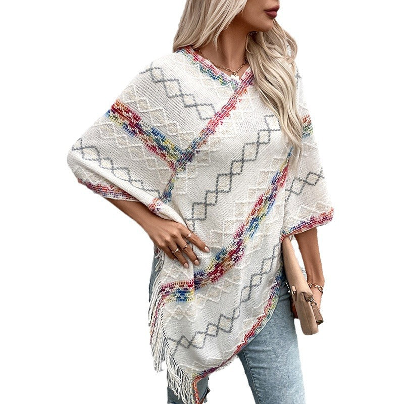 Elegant oversized sweater for women with fringe hem and unique pattern Lune London