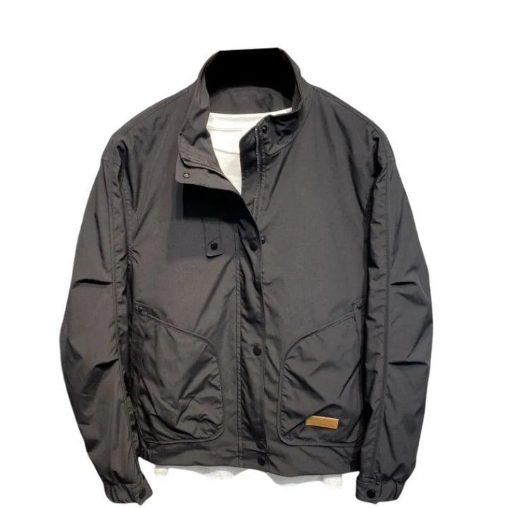 Durable transition jacket for men with practical pocket arrangement and adjustable collar Lune London