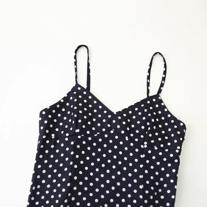 Midi dress for women with thin spaghetti straps and a playful polka dot design Lune London