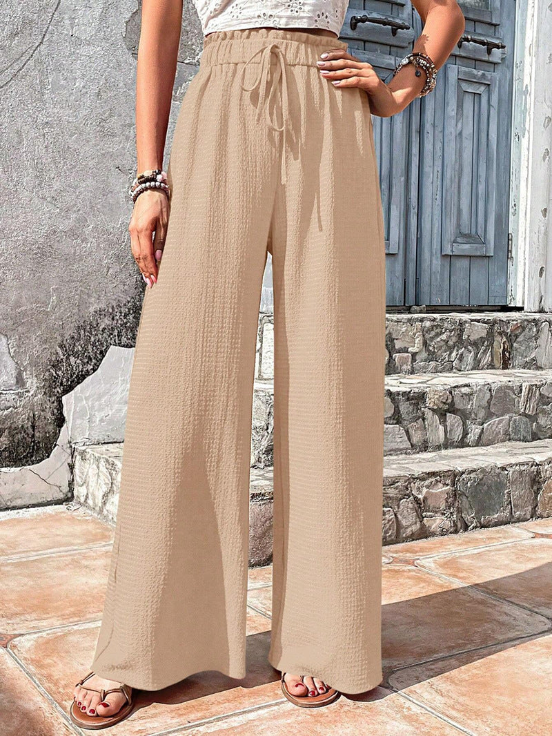 Loose summer pants for women with elastic waist and practical drawstring Lune London