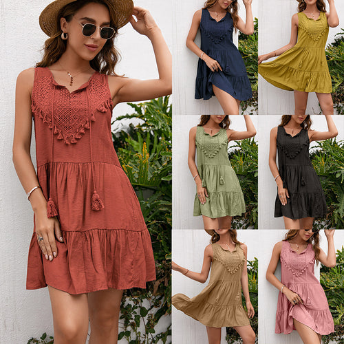 Sleeveless women's dress with crochet and pompom accents Lune London
