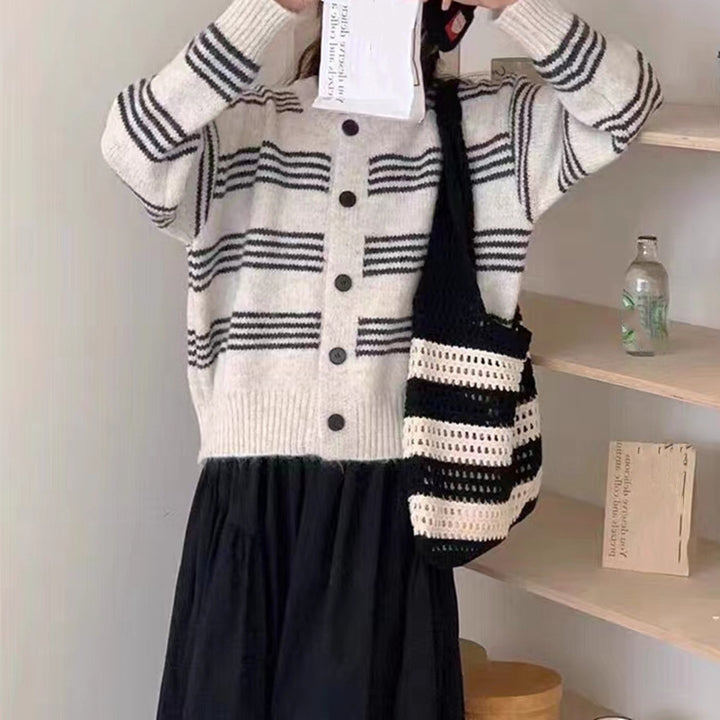 Fashionable knit jacket for women with a fine striped texture and decorative buttons Lune London