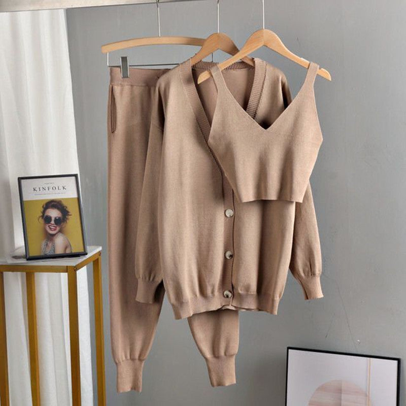 Elegant knitted women's outfit with chic button details