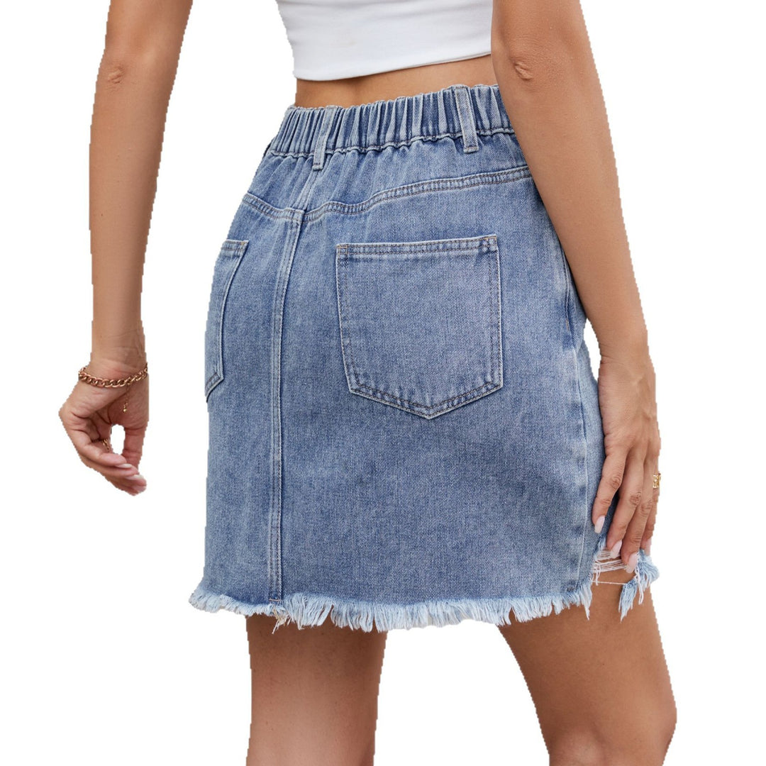 Women’s denim skirt with trendy destroyed design and frayed hem details Lune London