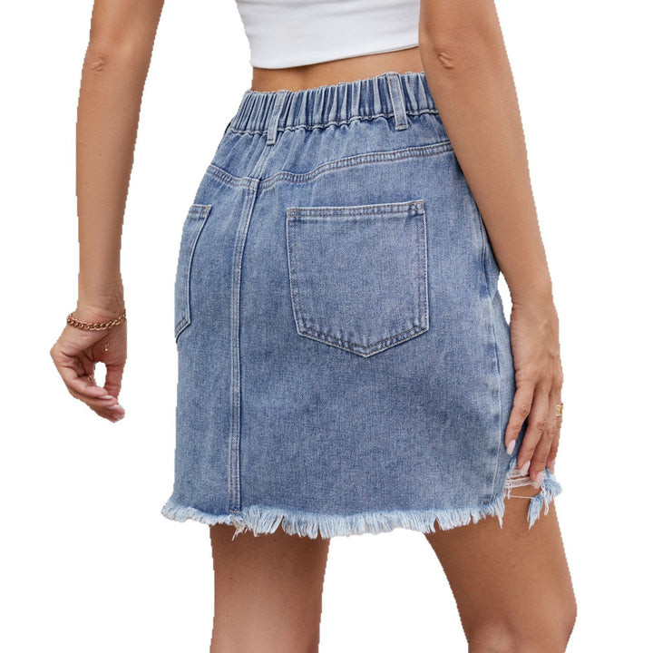 Women’s denim skirt with trendy destroyed design and frayed hem details Lune London