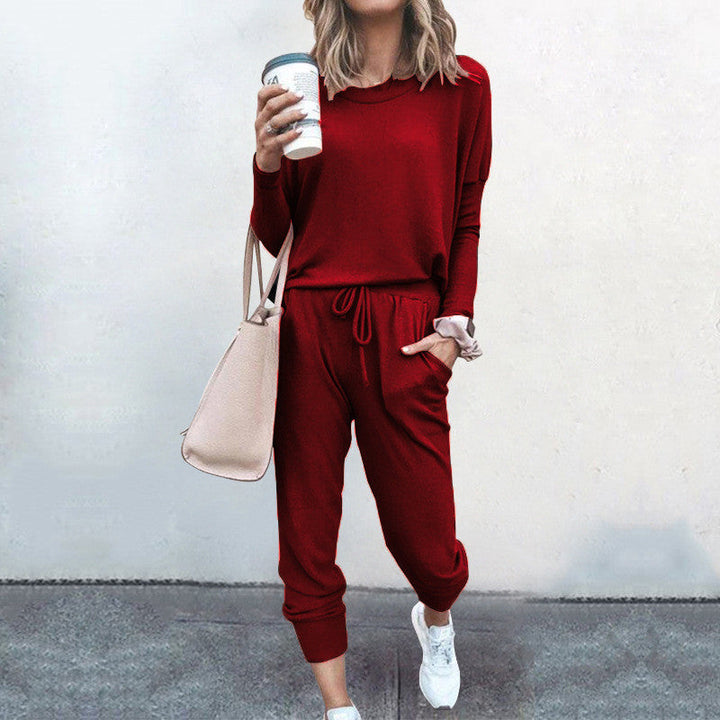 Women's Comfortable Jumpsuit with Stylish Round Neckline and Adjustable Waistband Lune London