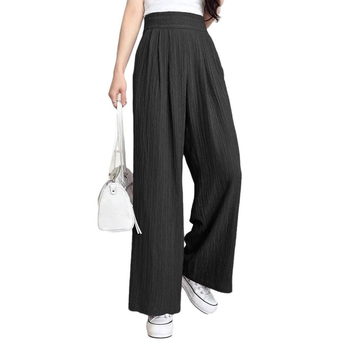 Wide pleated trousers for women with high pockets and elastic waist Lune London