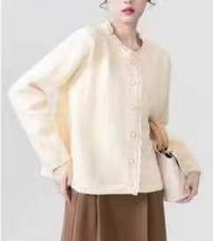Cardigan femme en maille fine avec fermeture à bouton décoratif et structures côtelées douces Chic & Stil