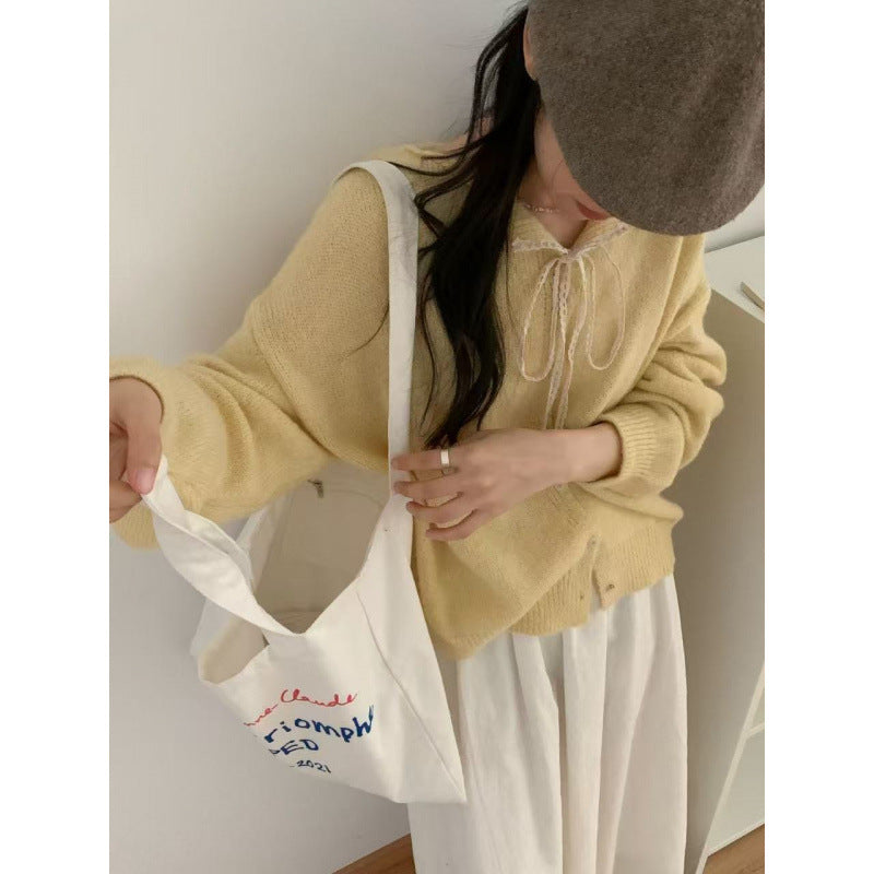 Cardigan à boutons pour femmes avec drap de tirage romantique