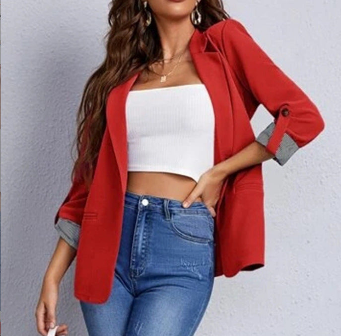 Fashionable women's blazer with roll-up sleeves and textured details Lune London