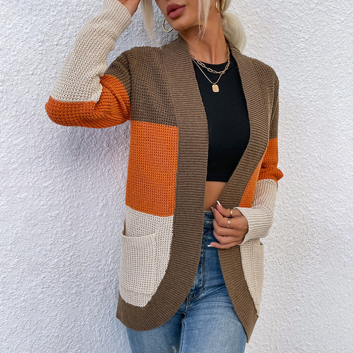 Women's knit jacket with a modern color block design and practical pockets Lune London