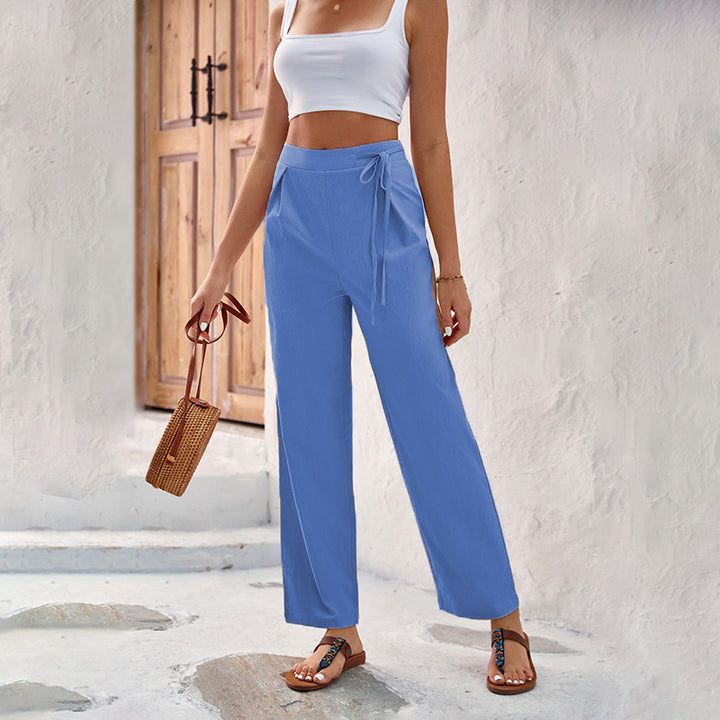 Loose summer pants for women with elastic waistband and tie belt Lune London