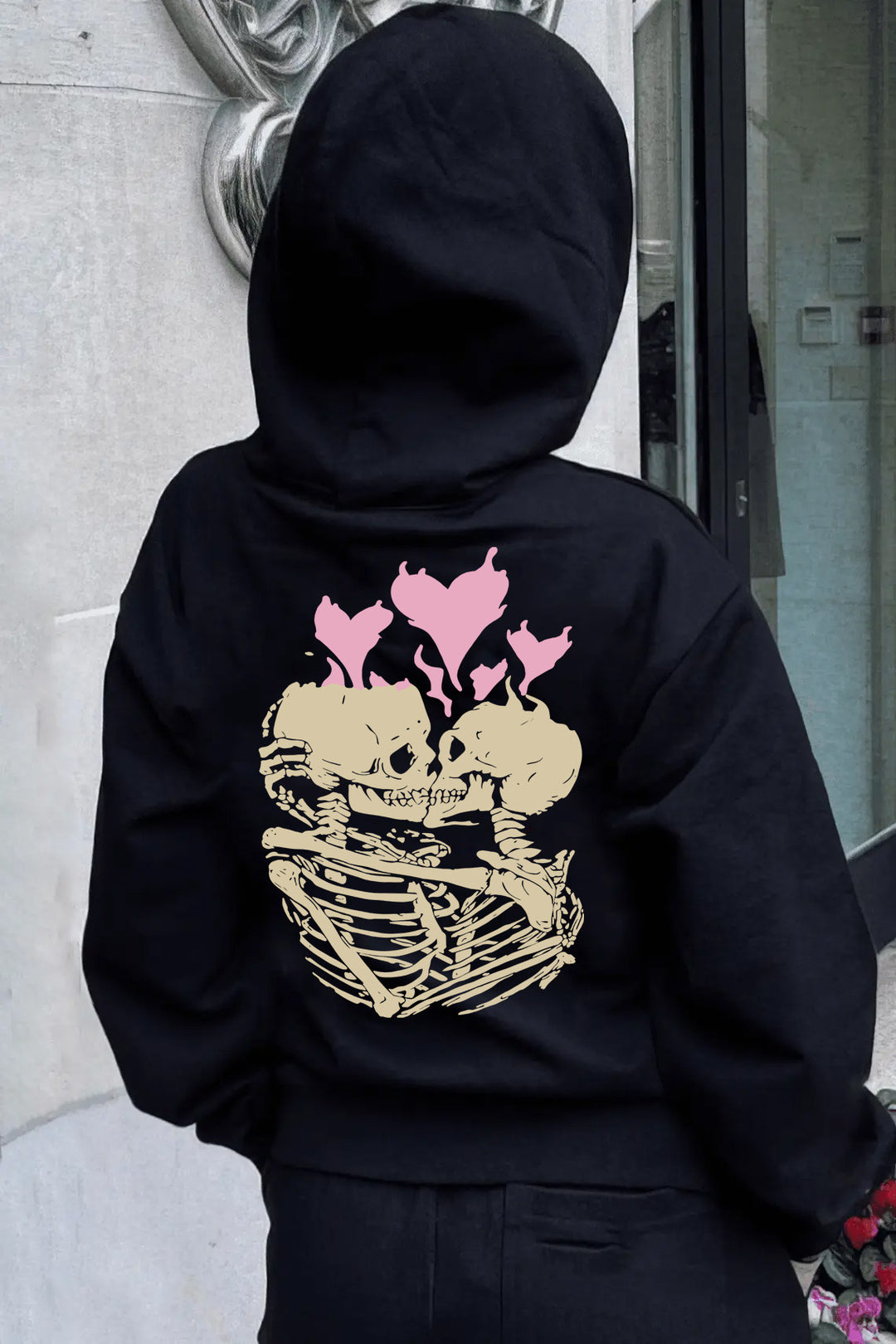 Lady Hoodie with unique skeleton pattern and chic heart graphic