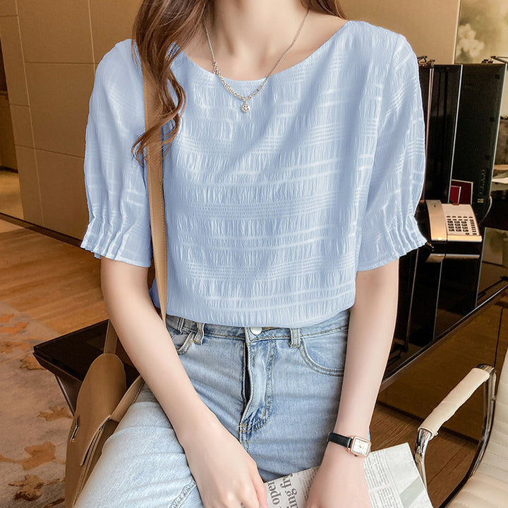 Haut féminin à la mode avec un design texturé léger et une coupe aérienne Chic & Stil
