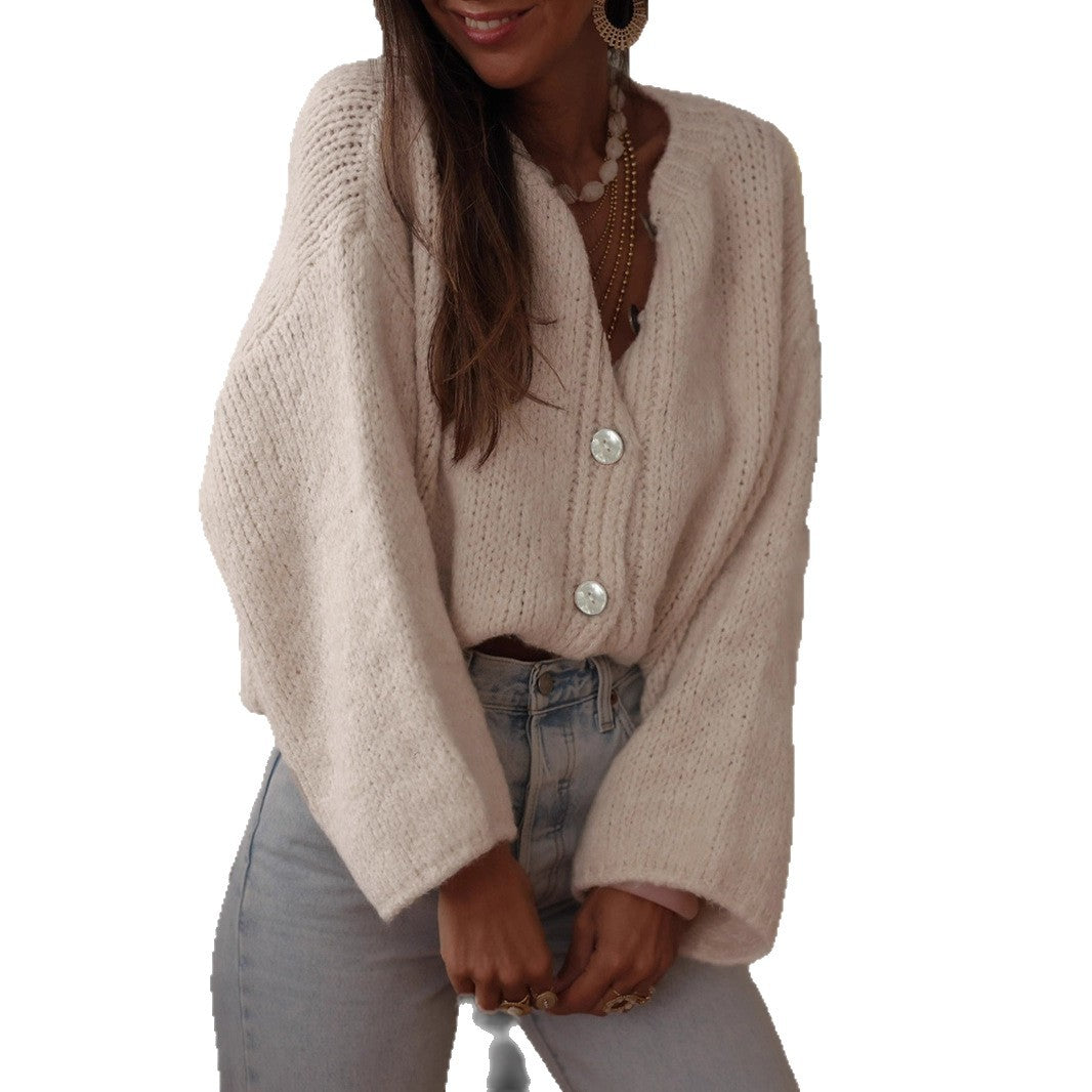 Ladies comfortable pullover with oversized sleeves and elegant pearl buttons Lune London