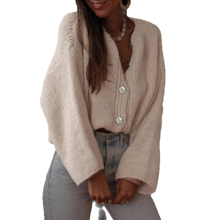 Ladies comfortable pullover with oversized sleeves and elegant pearl buttons Lune London