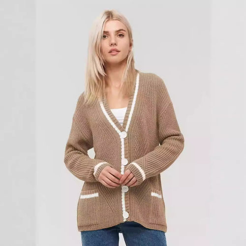 Ladies chunky knitted jacket with practical flap pockets and contrasting details Lune London